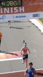Jill Murphy finishing a marathon